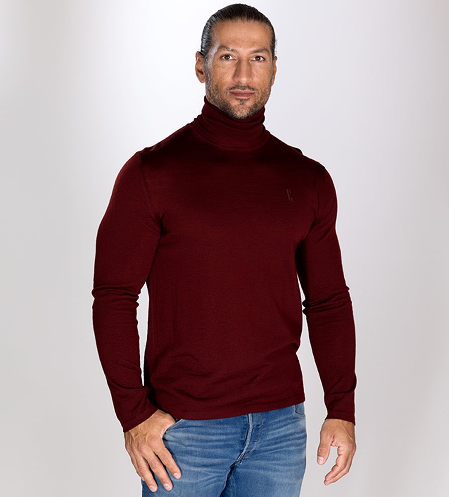 Röd turtleneck i ull Röd turtleneck i ull