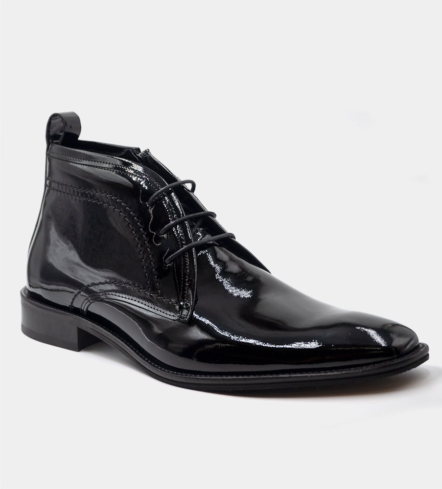 Svart lacksko med dragkedja